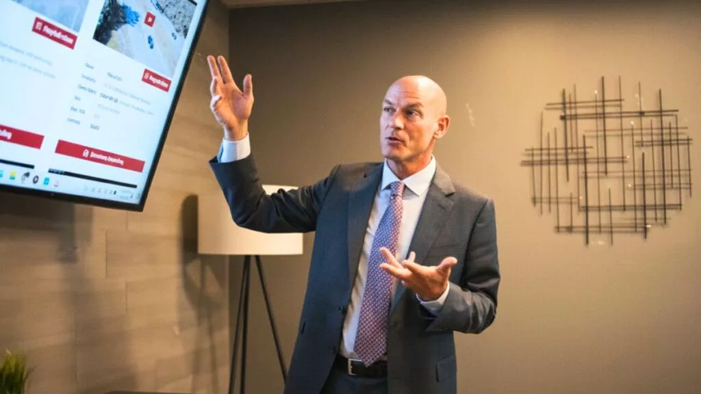 Sam aguiar discussing car accident scene on louisville interstate highway