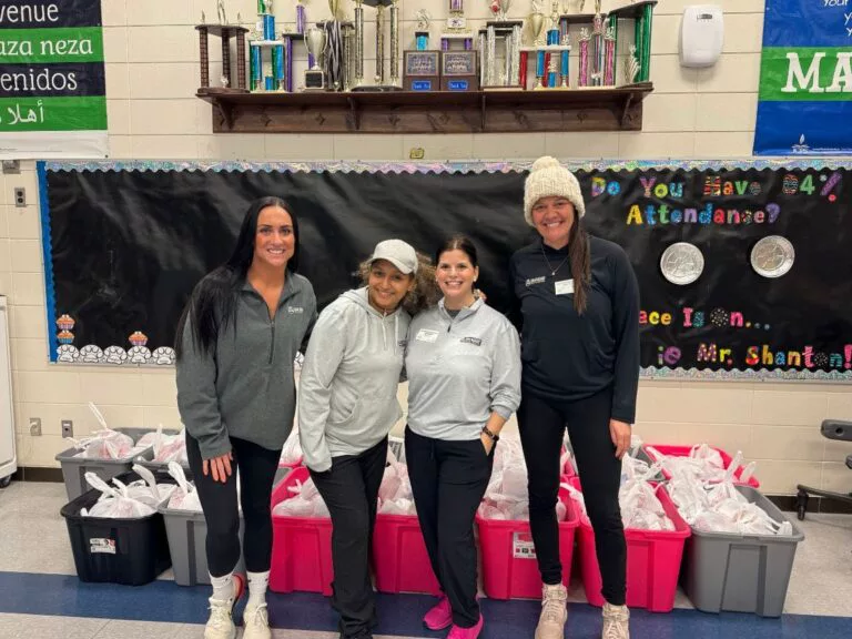 Group of people with donation bags.