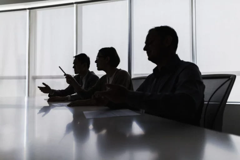 Insurance company representatives reviewing an accident claim