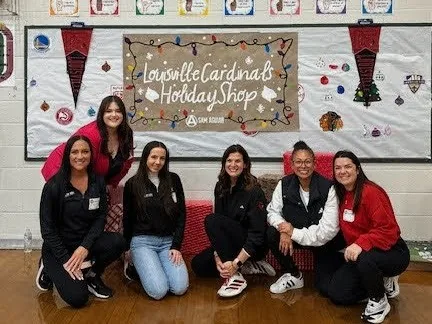 Sam aguiar injury lawyers uofl holiday shop community event