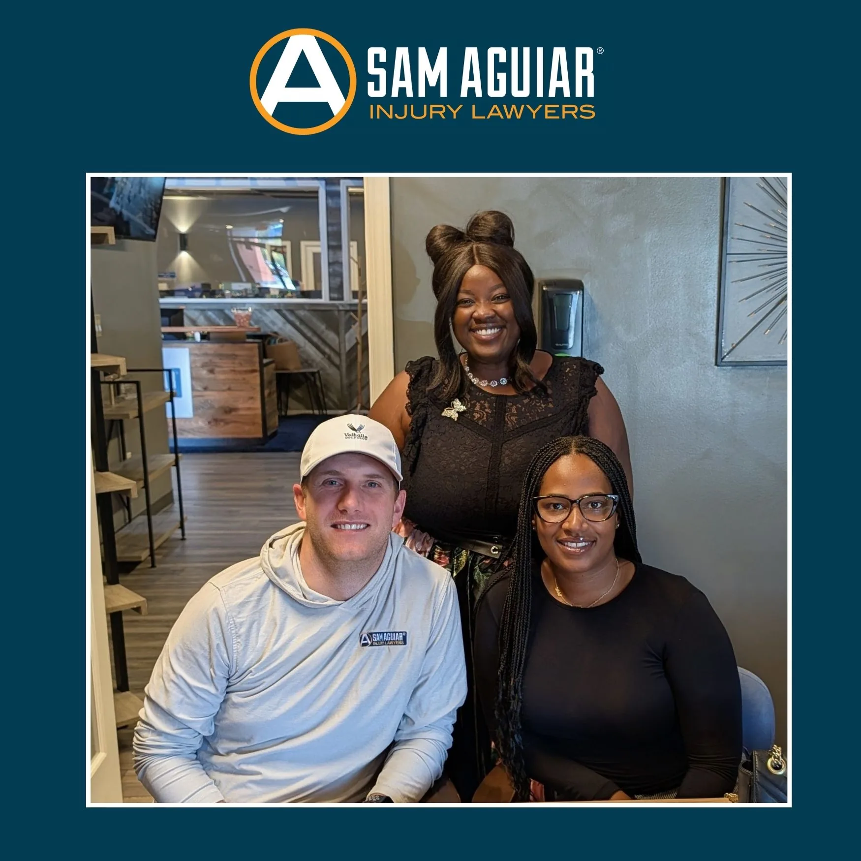 Client celebrating a successful settlement with the sam aguiar injury lawyers team