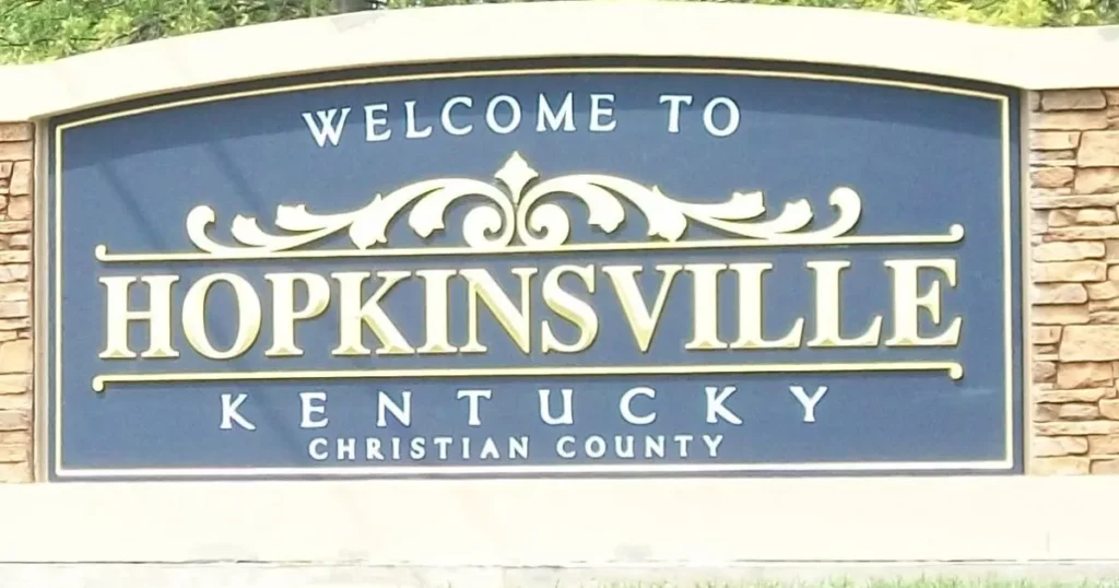 Welcome to Hopkinsville, Kentucky sign set in a stone wall