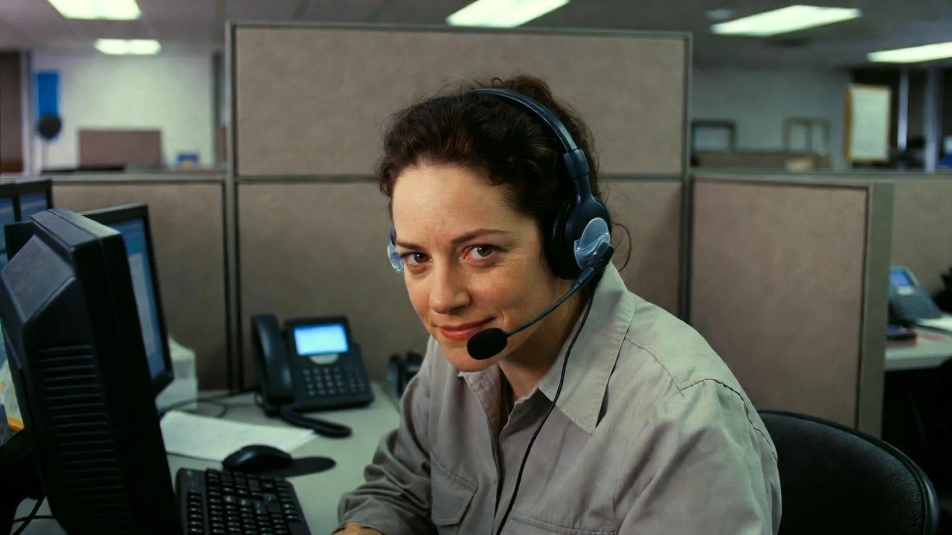Insurance claims adjuster wearing a headset on a recorded call