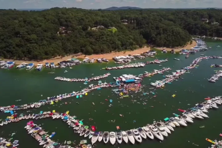 Aerial view of boats gathered in a Kentucky lake cove