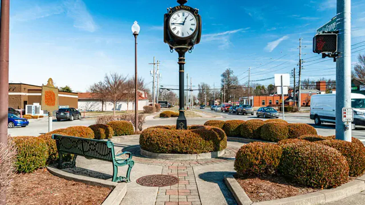 Street clock and benches in a landscaped Lyndon plaza