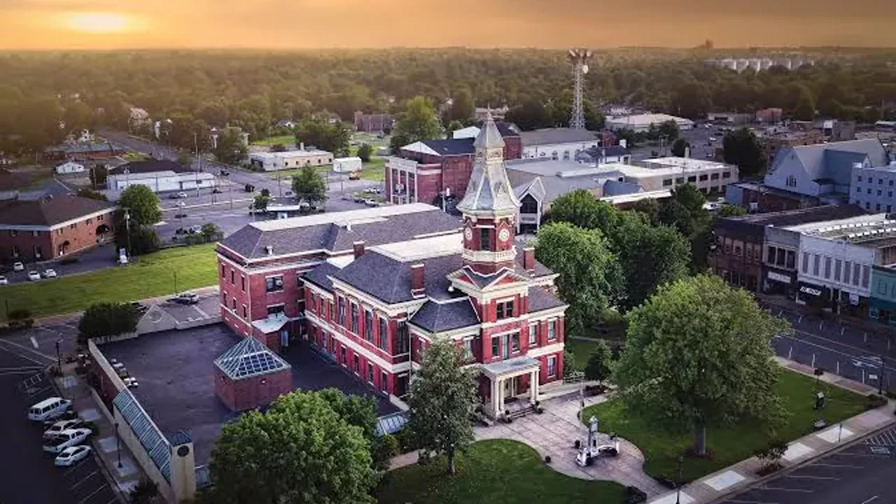 Aerial view of the Graves County Courthouse in Mayfield Kentucky at sunset