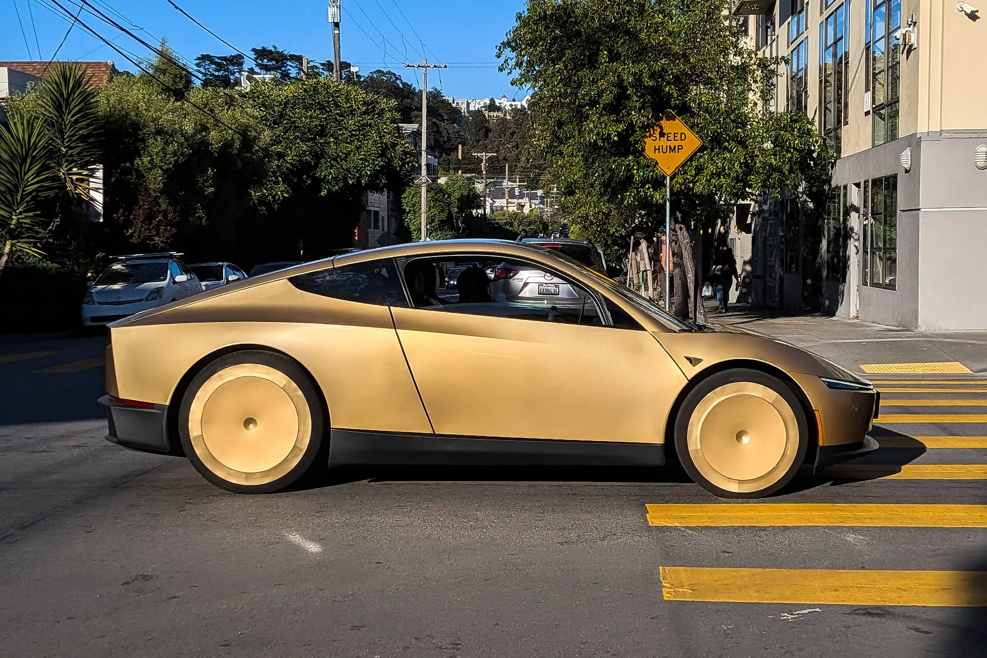 Gold Tesla Cybercab on a San Francisco street